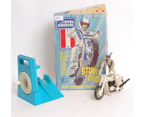 An original vintage retro Evel Knievel; Stunt Cycle toy by Ideal. In original box, with 2x figures. 
