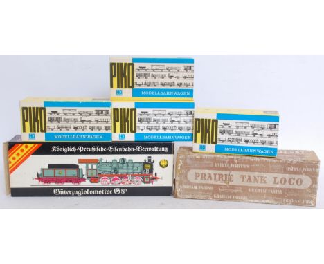 TRAINS; A collection of three assorted vintage railway trainset items to include a Graham Farish Prairie Tank Loco body in or