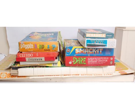 BOARD GAMES; A large collection of assorted vintage board games etc comprising of; Ideal Crossfire, Dare, Smack It, Titanic M