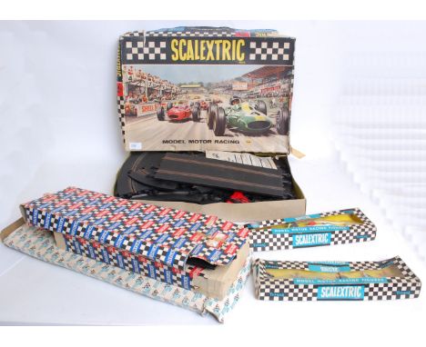 SCALEXTRIC: A good collection of assorted vintage Scalextric bits and pieces to include a boxed set (with cars), boxed contro