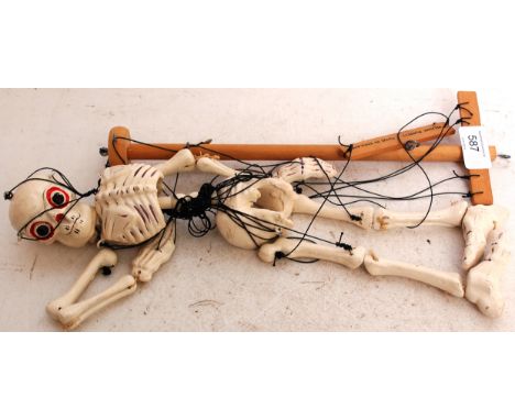 PELHAM PUPPET; A rare Pelham Puppet halloween Skeleton, unboxed but with original handle marked 'Pelham'. 