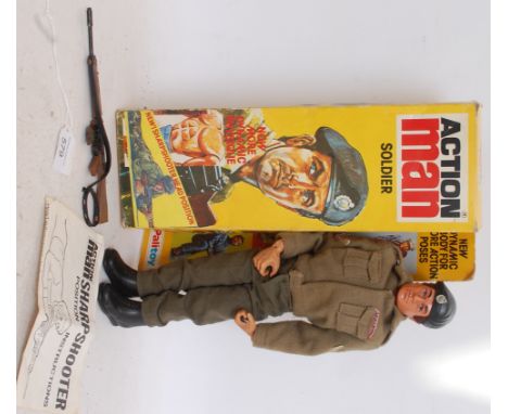 ACTION MAN; An original Action Man Palitoy soldier figure, complete in original box with instructions and machine gun. 