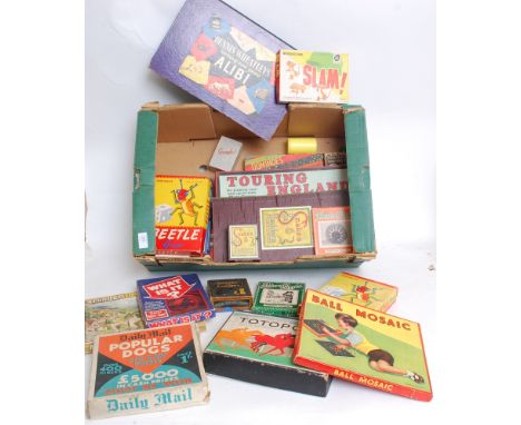 A good collection of assorted vintage (early 20th century and later) games and toys to include; Totopoly, Popular Dogs, Ball 