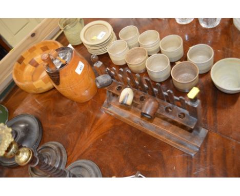 A wooden fruit bowl; a pipe rack; and a turned wooden barrel