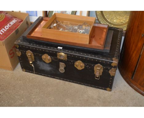 A metal bound travelling trunk