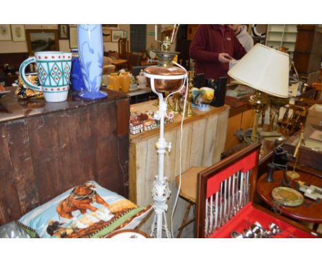 A wrought iron oil lamp converted to electricity; together with a bamboo table; and a mahogany drop leaf table 