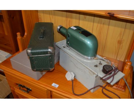 A quantity of vintage projector items 