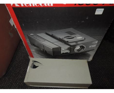 A boxed Reflecta 1800 AF slide projector and slide box AF