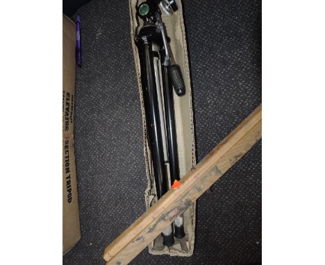 A Minori Elevator Tripod and an artists easel 
