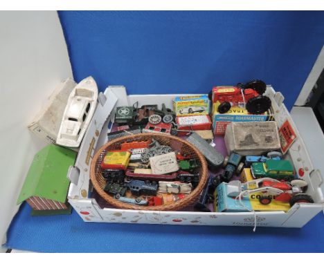 A box of die-cast and tin plate toys including a Corgi MF65 tractor with shovel, a Lone Star tractor, Matchbox Lesney vehicle