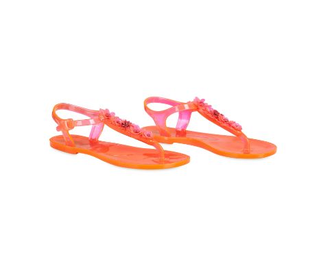 CHANEL NEON PINK JELLY SANDALS Condition grade B. Neon pink sandals with flower detailing, CC logos and adjustable ankle stra