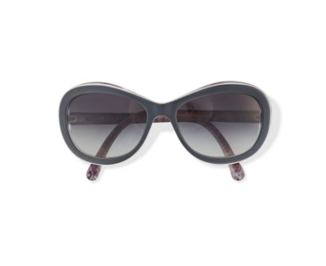 NO RESERVE CHANEL 5219 SUNGLASSES Condition grade B-. Oval shape with gradient lenses and grey frames decorated with CC emble
