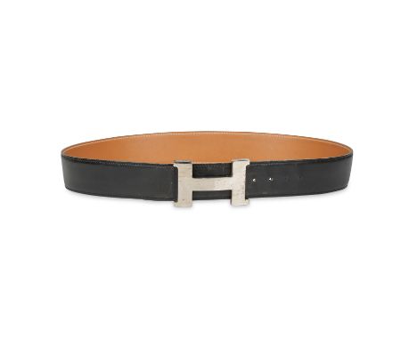 NO RESERVE HERMÈS VINTAGE CONSTANCE LEATHER BELT Condition grade C-. Black leather belt with tonal stitching, brown leather i