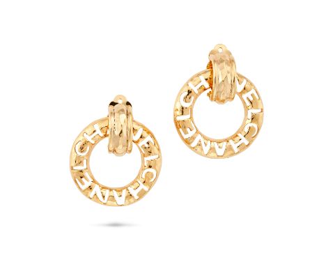 CHANEL LOGO CUT-OUT HOOP CLIP-ON EARRINGS Each comprising a circular hoop with cut-out CHANEL logos, signed Chanel, size 3.3c