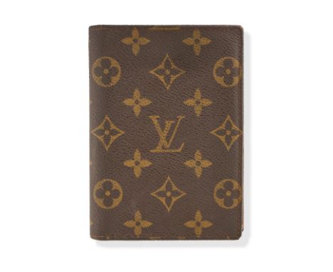 NO RESERVE LOUIS VUITTON VINTAGE MONOGRAM PASSPORT WALLET Condition grade C. Monogram coated canvas exterior. Brown leather l