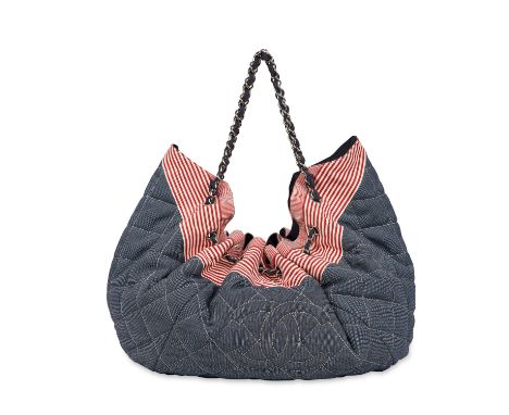 CHANEL DENIM COCO CABAS TOTE BAG Condition grade B+. Denim diamond quilted exterior accented by red and white striped canvas 