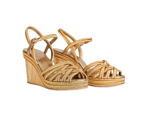 CHANEL GOLD ESPADRILLES SANDALS Condition grade C+. Metallic gold wedges with woven thread straps, platforms, open toe, ankle