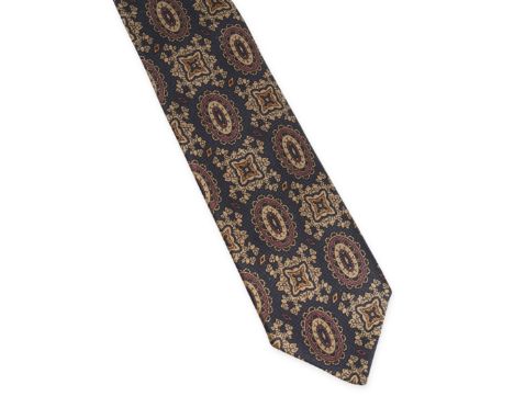 NO RESERVE CHANEL PATTERNED TIE Condition grade B+. Dark blue background with beige, yellow and dark red abstract patterns. 1