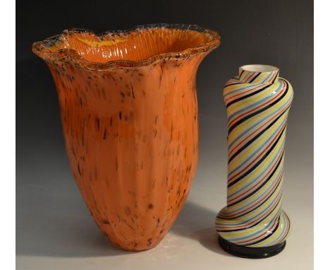 A large Murano glass tulip shaped vase, in bright orange with flecks of brown, 35cm, original label; a sprirally fluted cylin