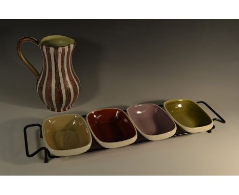 A Denby Tigo Ware four-section hors d'oeuvre dish, each with coloured interiors in olive, lilac, buff and ruby,  metal stand,