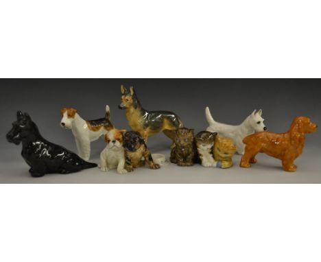 A Royal Worcester model,  Alsatian, 3296;  others,  Scottish Terrier, 3029;  Cocker Spaniel, 2944;  Airedale Terrier, 3027;  