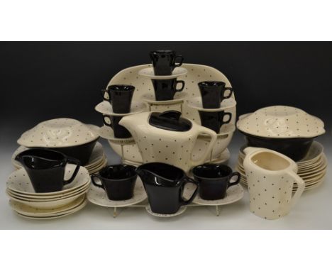 A 1950s J&G Meakin Domino pattern part dinner and coffee service, the cube shaped teapot with angular spout, printed with bla