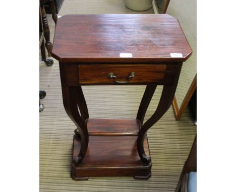 A MAHOGANY COLOURED PROBABLY IMPORTED HARDWOOD CONSOLE TABLE with a single drawer 