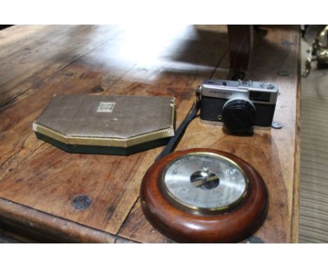 A BOX CONTAINING A WALL MOUNTABLE BAROMETER, an Olympus trip 35 camera &amp; a Waddingtons boxed sets of playing cards &amp; 