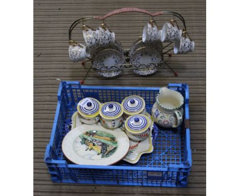 A LATE 1950s / EARLY 1960s CUP &amp; SAUCER BRASS CADDY together with a basket containing a selection of domestic pottery var
