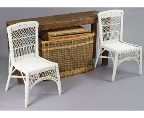 A woven rattan rectangular side table on square legs, 59” wide x 32½” high x 16½” deep; together with a pair of white painted