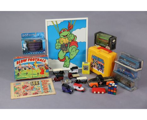 Eleven Various die-cast scale models, a framed 1990s Teenage Mutant Ninja Turtles poster, &amp; various other toys, etc.