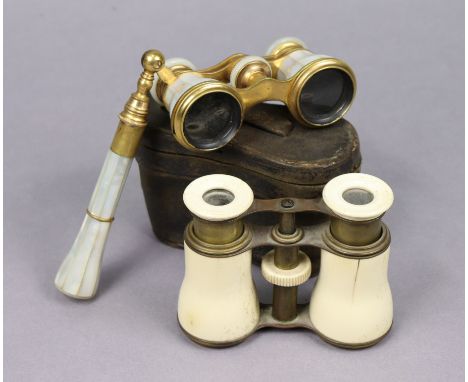 A pair of mother-of-pearl veneered &amp; brass lorgnette opera glasses, and a pair of bone opera glasses, with case.
