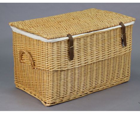 A large wicker hamper, 35” wide x 21” high.