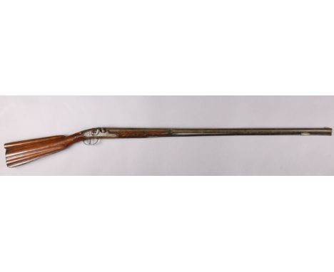A MID 18th century PERCUSSION CAP SPORTING GUN CONVERTED FROM A FLINTLOCK, the barrel in two stages, octagonal and round with