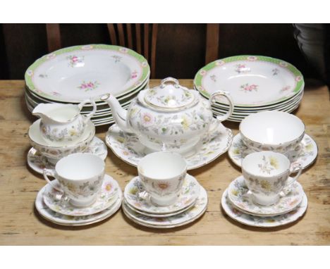 A Coalport bone china “Somerset” twenty-one piece part tea service; &amp; a “Diamond Rose” fifteen piece part dinner service.
