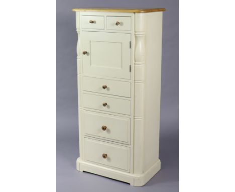 A Laura Ashley&nbsp;light oak &amp; white finish upright cabinet fitted with an arrangement of six drawers &amp; a small cupb