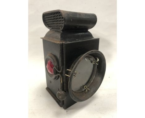 A Ford black enamelled Radyot paraffin motor lamp.
