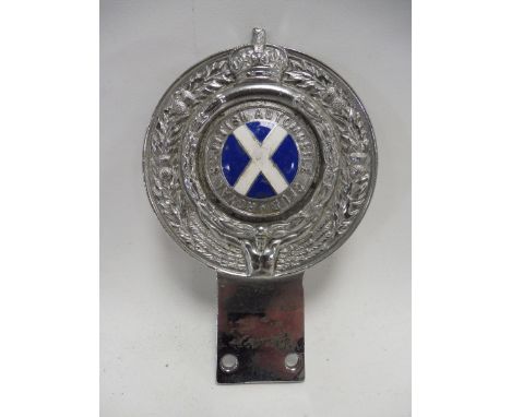 A Royal Scottish Automobile Club part enamel car badge stamped to reverse no. 1573.