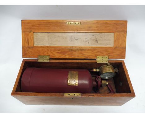 A rare Rolls-Royce/Bentley vintage oak running board mounted gas bottle and gauge for lighting front and rear lamps, as fitte