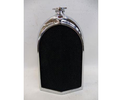 A Ruddspeed decanter in the form of a Bentley 3 litre radiator. 