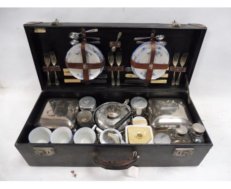 A Sirram six-person picnic set with silver plated fittings. 