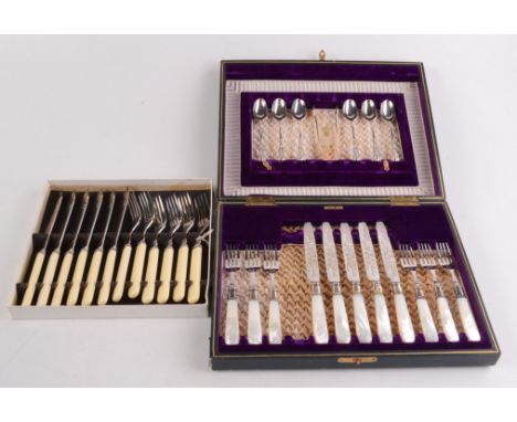 A cased, silver plated six piece cutlery set, the knives and forks with silver collars and mother of pearl handles (one knife