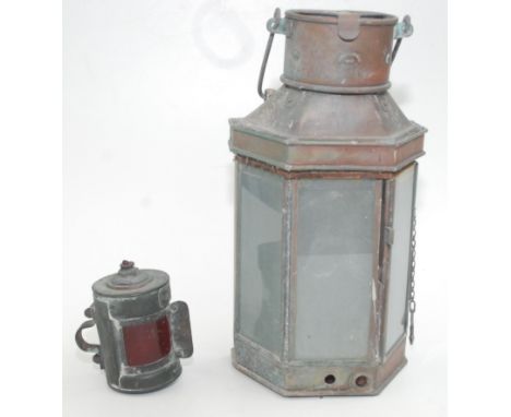 A copper ships lantern, 'Alderson & Gyde, Birmingham 1943', height 40cm and a 'Simpson Lawrence' boat lamp.