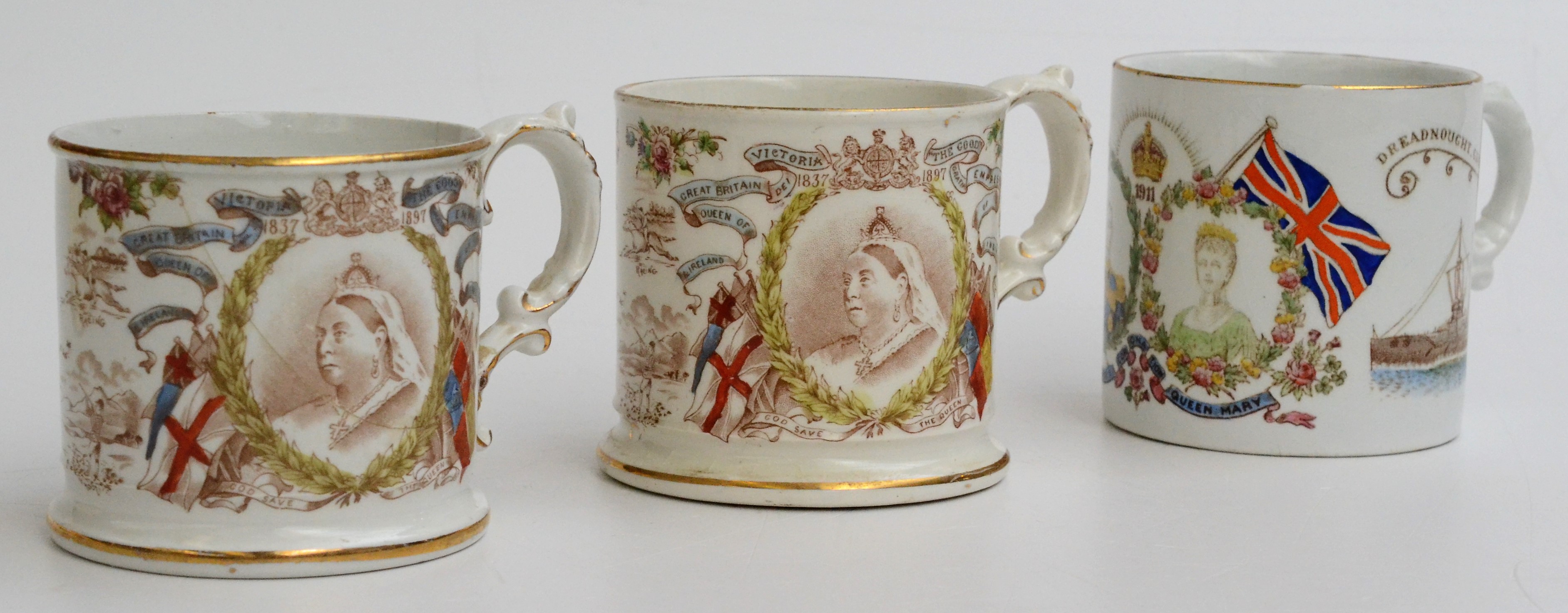 Two Queen Victoria coronation ware mugs and a V mug. Condition