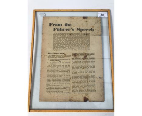 A double sided leaflet 'From The Fuhrer's Speech' in a glazed panel, leaflet size 31.5 x 22.5cm. 