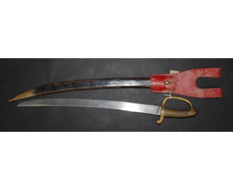 A 19th century French infantry short sword with curved blade and brass hilt with brass mounted scabbard and red frog.