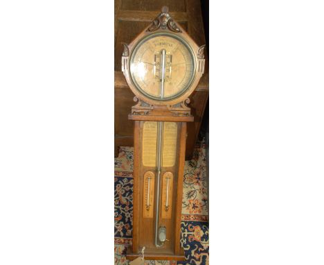 An oak cased Admiral Fitzroy's Royal Polytechnic wall barometer, late 19th/early 20th century, length 104cm, width 32cm. 