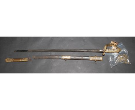 A Victorian naval officer's sword by Seagrove Hard Portsea with single edged slightly curved blade, with scabbard. 