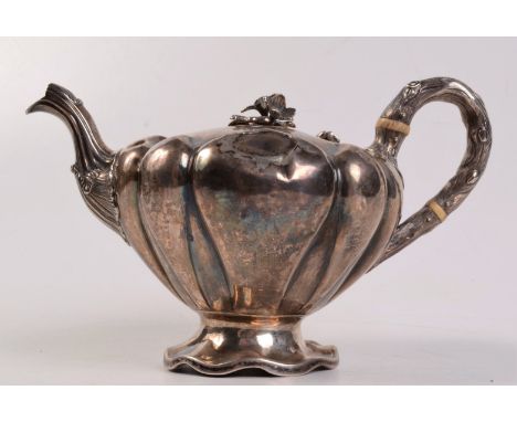 An unusual William IV bachelors tea pot with flower finial by John Welby. 13oz.