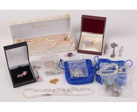 A Swarovski amethyst set pendant, silver brooches and other silver jewellery etc. 